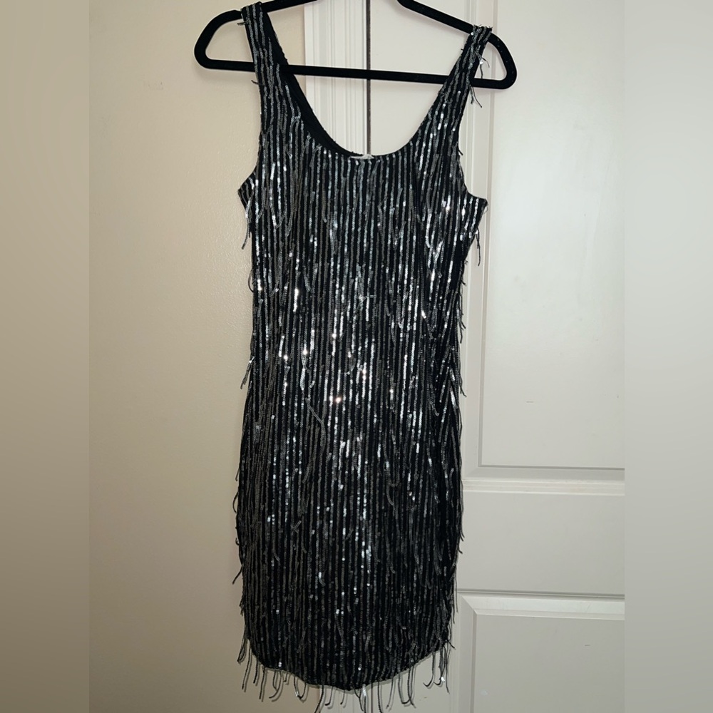 Party dress, silver hanging sparkles.